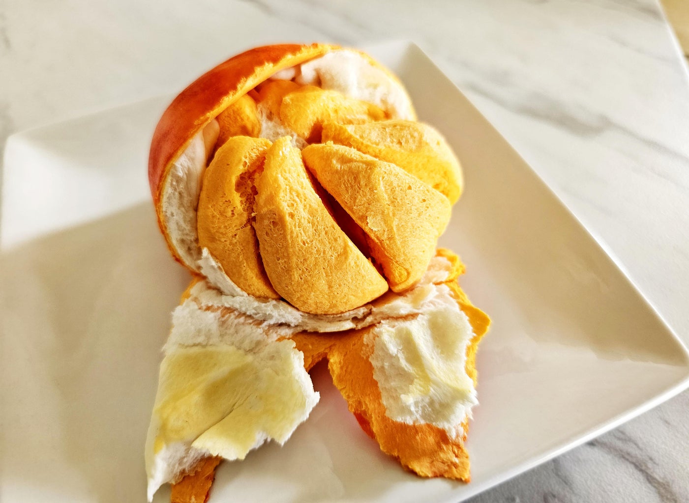 Segmented Orange Mantou