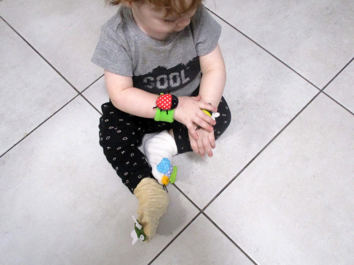 DIY Wrist Rattles and Foot Finder Socks - a Wearable Sensory Toy